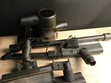 a lot of guns that are sitting on a table