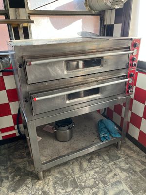 un four à pizza électrique en inox PIZZAGROUP double chambre…