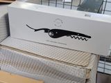 a box with a picture of a dog on it sitting on top of boxes