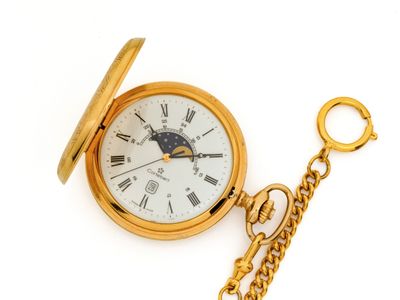 une montre à gousset en or avec une chaîne autour d'elle