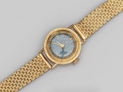 une montre-bracelet en or 18 carats avec un cadran bleu