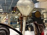 many vases that are sitting on a table