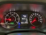 a close up of a car dashboard with various gauges