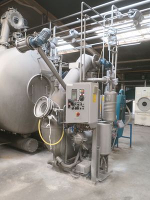 a large machine that is sitting inside of a building