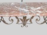 a marble table with a bird on top of it