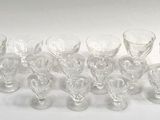a lot of empty wine glasses sitting on a table