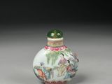 a white and green glass snuff bottle with birds and flowers on it