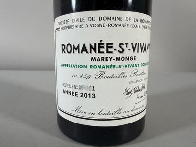 a bottle of wine that is sitting on a table
