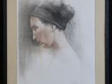 une image représentant un tableau d'une femme portant un bandeau