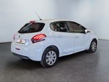 the back end of a white car in a white room