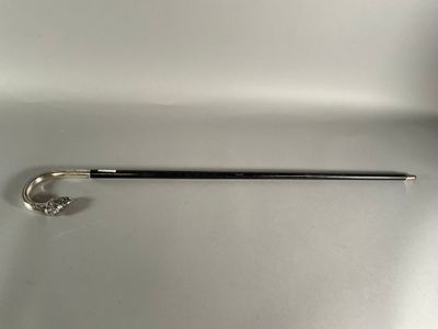 an image of a metal object on a white surface