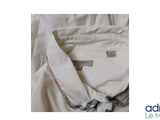 a picture of a white shirt with a checkered collar