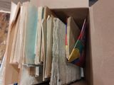 a box full of books sitting on the floor