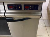 an image of a kitchen with a stove and a dishwasher