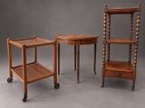 three pieces of furniture including a table, shelf and shelf