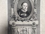 une vieille photo d'un homme en costume-cravate, assis devant une cheminée