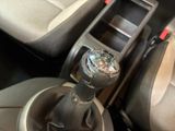 a close up of a gear stick in a car