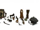 a lot of small figurines that are on the table