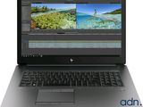 a laptop with a picture of a beach on the screen
