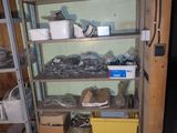 a room that has a bunch of shelves in it