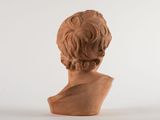 an image of a clay bust of a woman on a white background