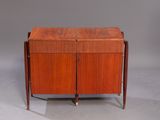 a wooden cabinet with two doors and two drawers