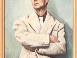 portrait of a man in a white coat with his arms crossed
