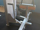 a machine that is sitting on the floor in the gym