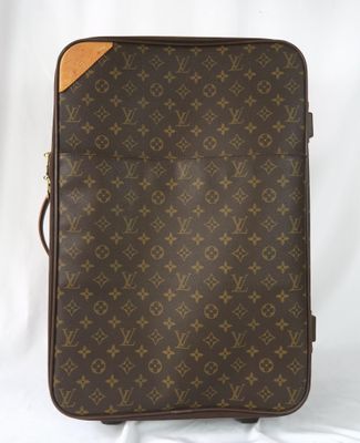 Valise Louis Vuitton en toile Monogram avec finitions en cuir