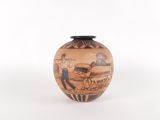 a vase with a picture of a man and a dog on it
