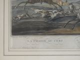 a drawing of a man on a horse chasing a group of dogs