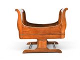 a wooden sleigh with a sleigh on top of it