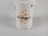 a close up of a container of vitamin g on a table