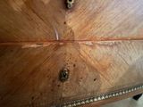 a close up of a piece of wood that has been stained