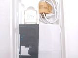 a white box with a charger and a charger on it