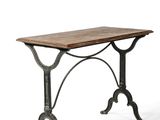 a wooden table with metal legs and a wooden top