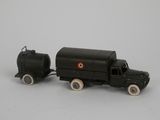 a toy truck with a tank on the back of it