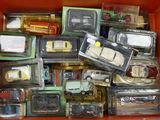 a box full of toy cars and trucks in it