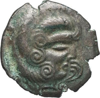 une pièce de monnaie ancienne sur laquelle figure un visage