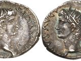 a silver coin with an image of a man on it