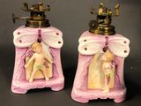 pair of pink and white ceramic salt and pepper shakers with angels