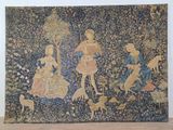 a tapestry hanging on the wall of a room