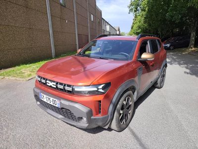 the red car is parked on the side of the road