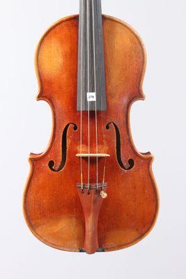 a close up of a violin with a bow on a white background