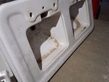a white sink that is sitting on the floor