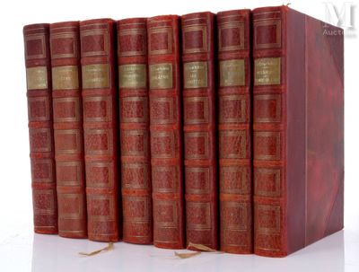 six red books are lined up in a row on a white surface