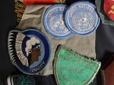 many different patches and patches on a table