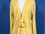a yellow cardigan sweater on a mannequin mannequin mannequin mannequin mannequin mannequin mannequin mannequin mann