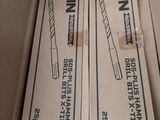 two boxes that have toothbrushes in them in them