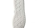 the sole of a pair of white shoes on a white background